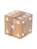 Closed wooden dice box viewed at an angle, showing white dots on the lid and two sides.