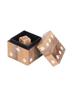 Open wooden dice box with its dotted lid leaning alongside and a wooden die visible inside the dark lining.
