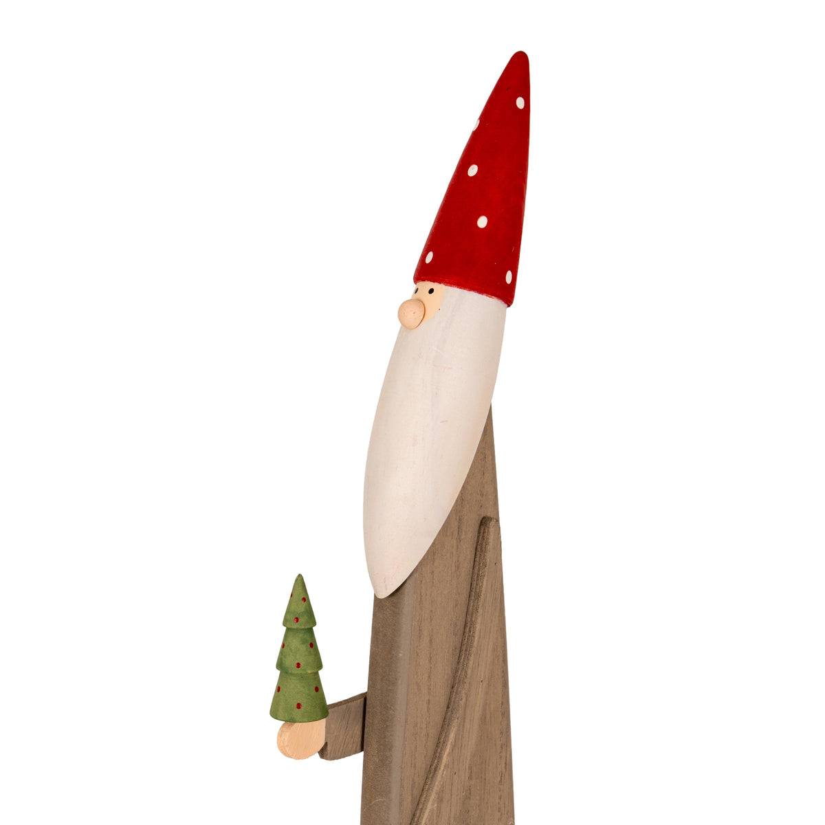 Close-up of the elf's dotted red hat, round nose and sweeping white beard, with red dots on the small green tree.
