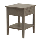 Grey-washed Drawerframe Side Table shown at an angle, with a framed drawer, round knob and open lower shelf.