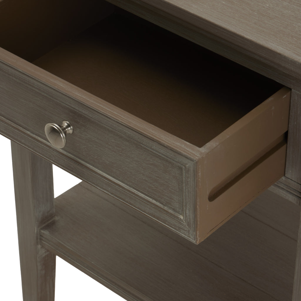 Drawer pulled open to show its brown interior and side panel above the table's lower shelf.