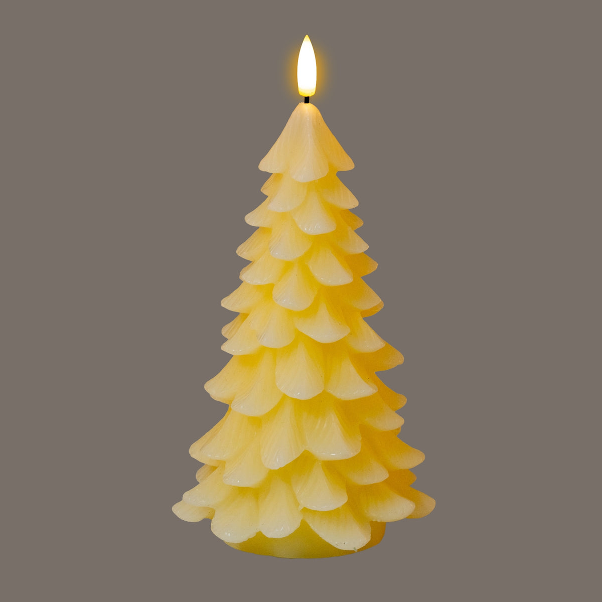 Cream tree-shaped LED candle shown illuminated against a grey background, with a bright flame-shaped tip above the layered branches.