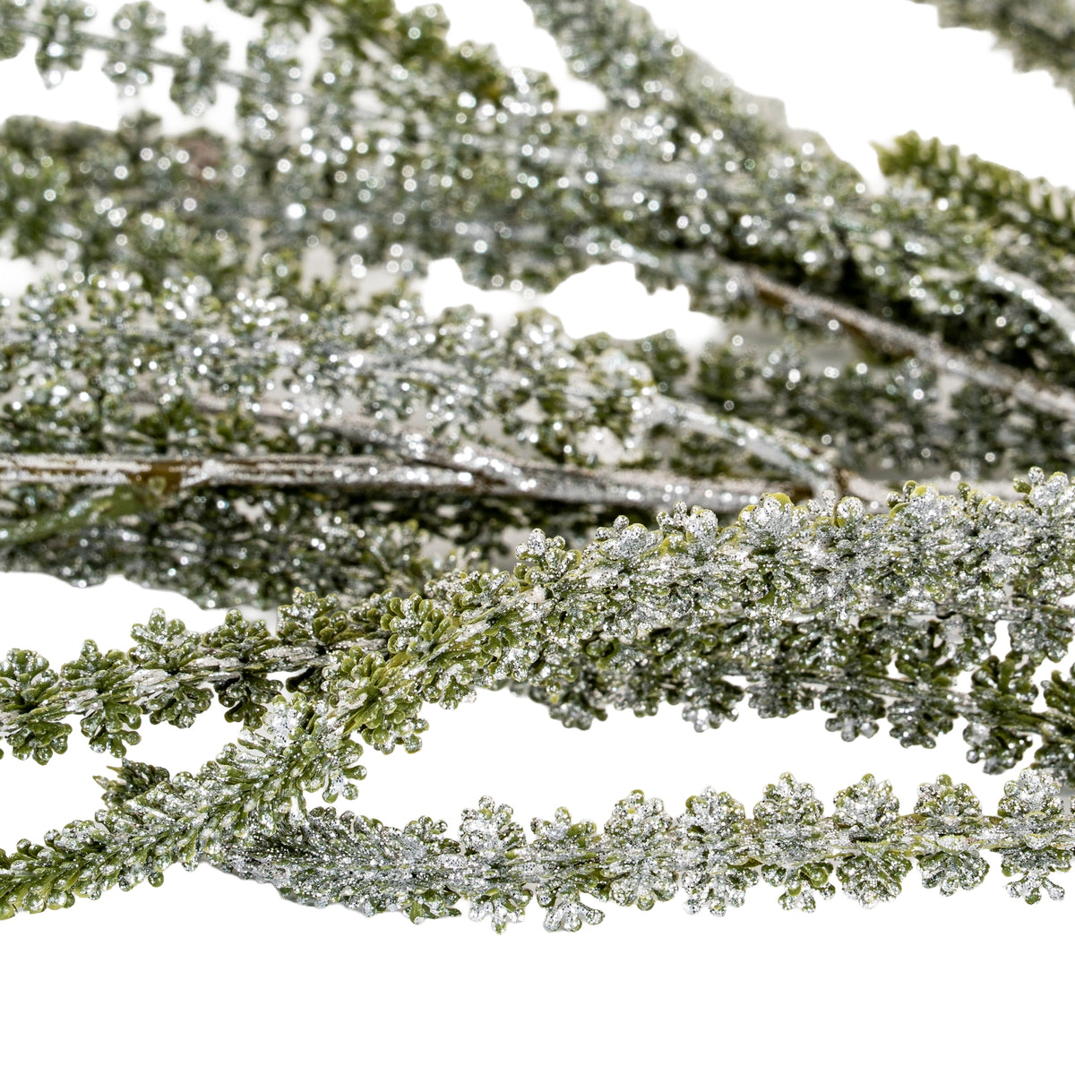 Extreme close-up of clustered green detail along artificial amaranthus fronds with a reflective silver finish.