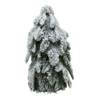 Full view of a tapered green tree decoration with drooping branches heavily coated in white snow effect.