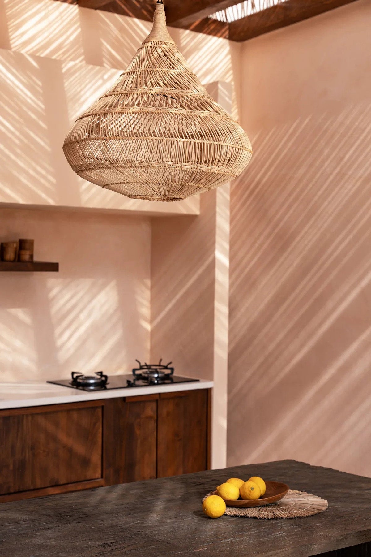 Drop Rattan Pendant Light – Natural, Medium — styled in a warm interior