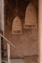 Elba Rattan Pendant Light – Natural, Large – large and medium pendants against a terracotta wall