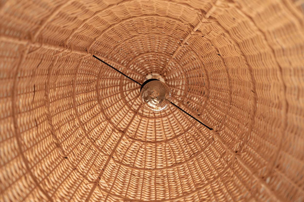 Elba Rattan Pendant Light – Natural, Large – underside rattan construction in warm light