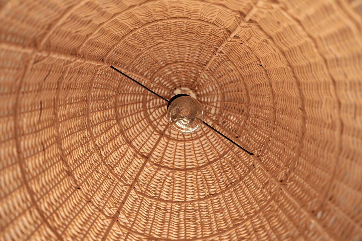 Elba Rattan Pendant Light – Natural, Large – underside rattan construction in warm light
