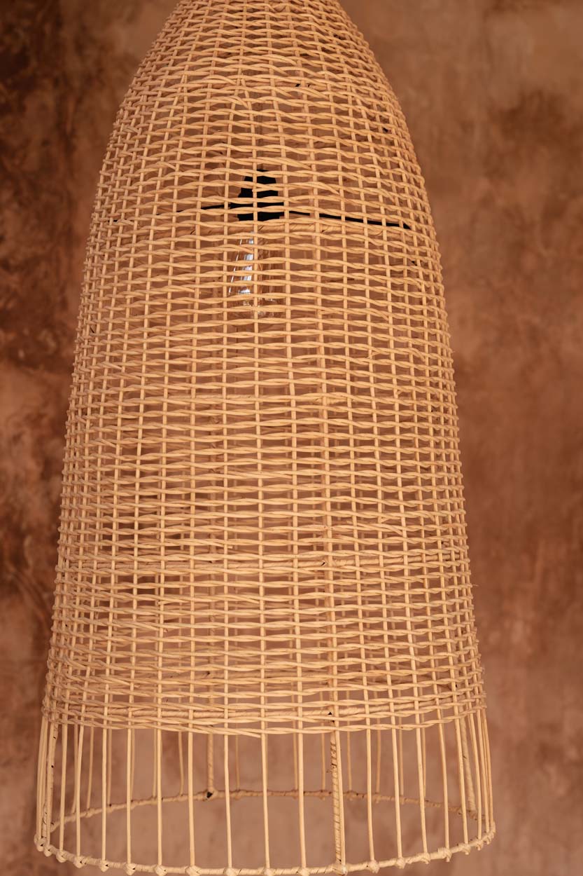 Elba Rattan Pendant Light – Natural, Medium – large and medium pendants against a terracotta wall