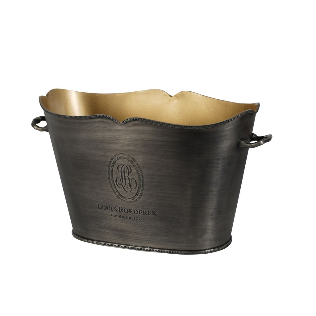 Angled view of the oval champagne bucket showing its golden interior, embossed front emblem and curved handles.