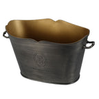 View from above of the empty champagne bucket, showing the oval golden interior and beaded, undulating rim.