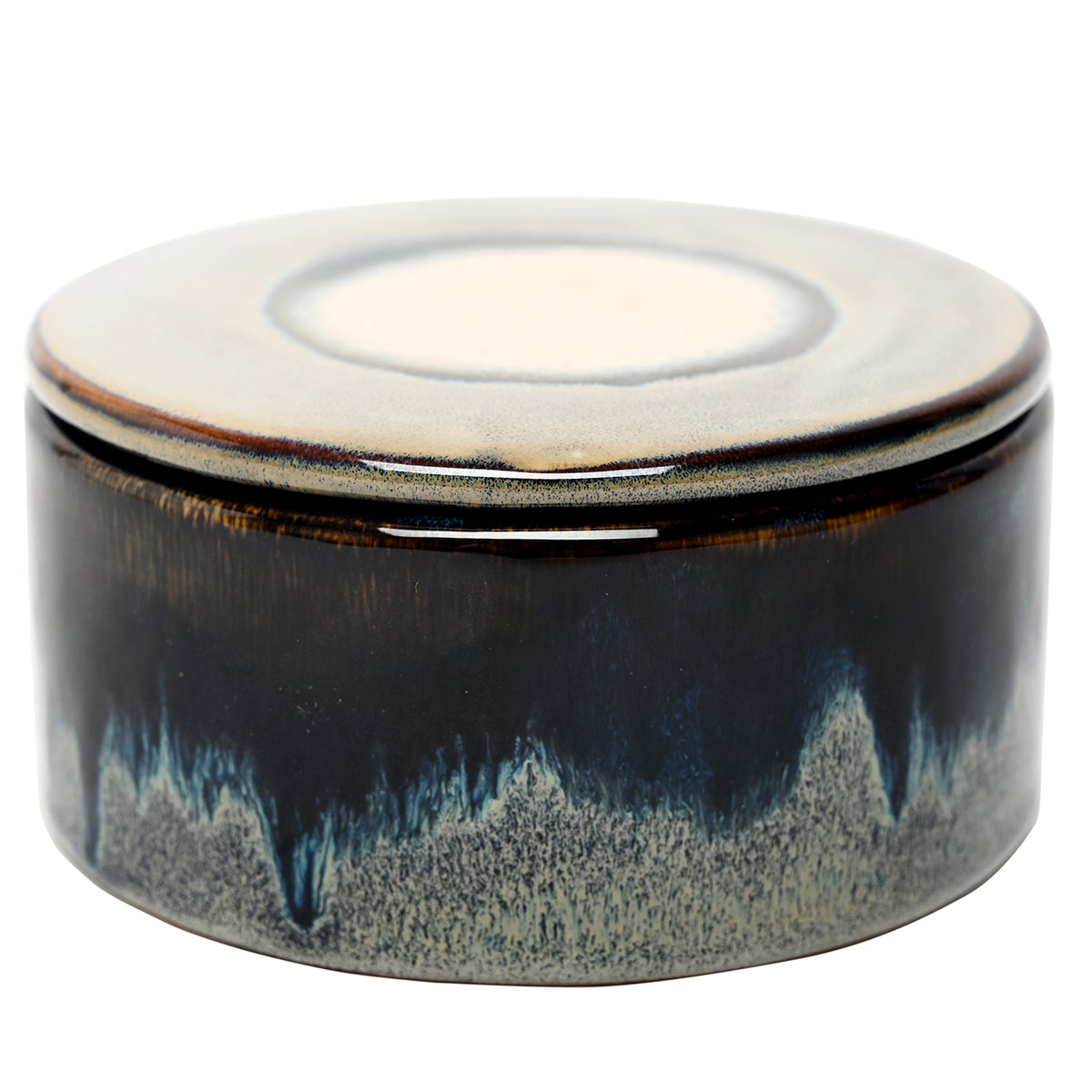 Low round candle vessel with lid fitted, showing deep blue glaze above a speckled pale grey lower band.
