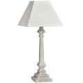 Faceted Rise Table Lamp with a pale tapered square shade, slender faceted stem and stepped square foot on a white background.
