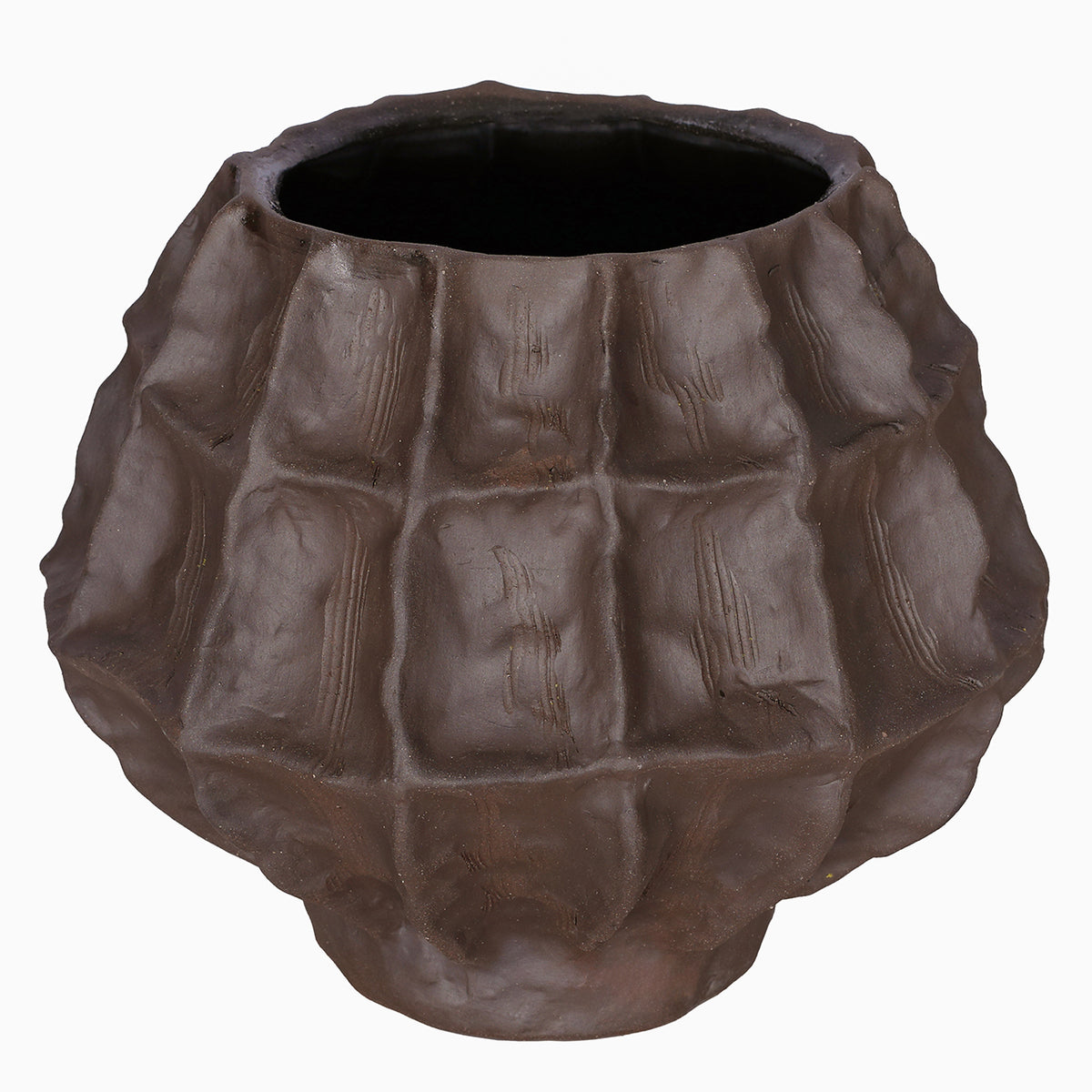 Angled view of the faceted brown vase showing its wide opening, dark interior and curved body.