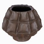Elevated view of the brown faceted vase showing its round opening, dark interior and narrow base.
