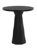 Black bar table with a round top and tall, faceted pedestal against a white background.