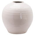 Rounded cream vase on a white background, showing fine crackle lines across the body and dark distressed marks around the short neck.