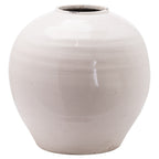 Rounded cream vase on a white background, showing fine crackle lines across the body and dark distressed marks around the short neck.