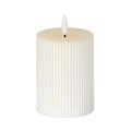 Warm-white ribbed LED candle on a white background, with a shallow top recess and white flame-shaped element on a short dark stem.
