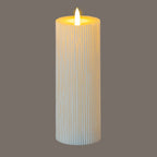 Ribbed warm-white LED candle shown against a grey background, with a bright flame-shaped element and a golden glow around the recessed top.