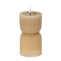 Stone-beige hourglass LED candle on a white background, showing fine vertical ribs, a recessed top and a white flame-shaped element.