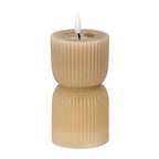 Stone-beige hourglass LED candle on a white background, showing fine vertical ribs, a recessed top and a white flame-shaped element.