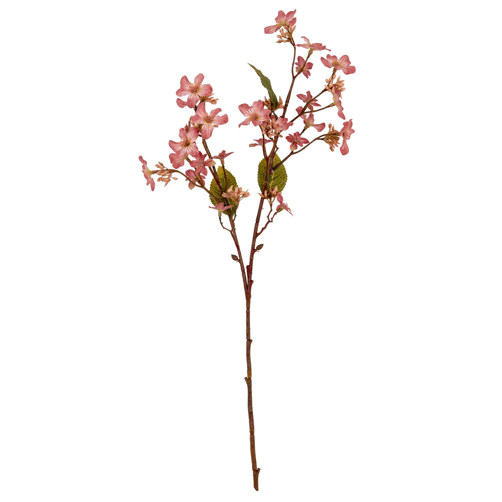 Full view of a pink artificial blossom spray with a long reddish-brown stem, fine spreading branches and olive-green leaves against white.