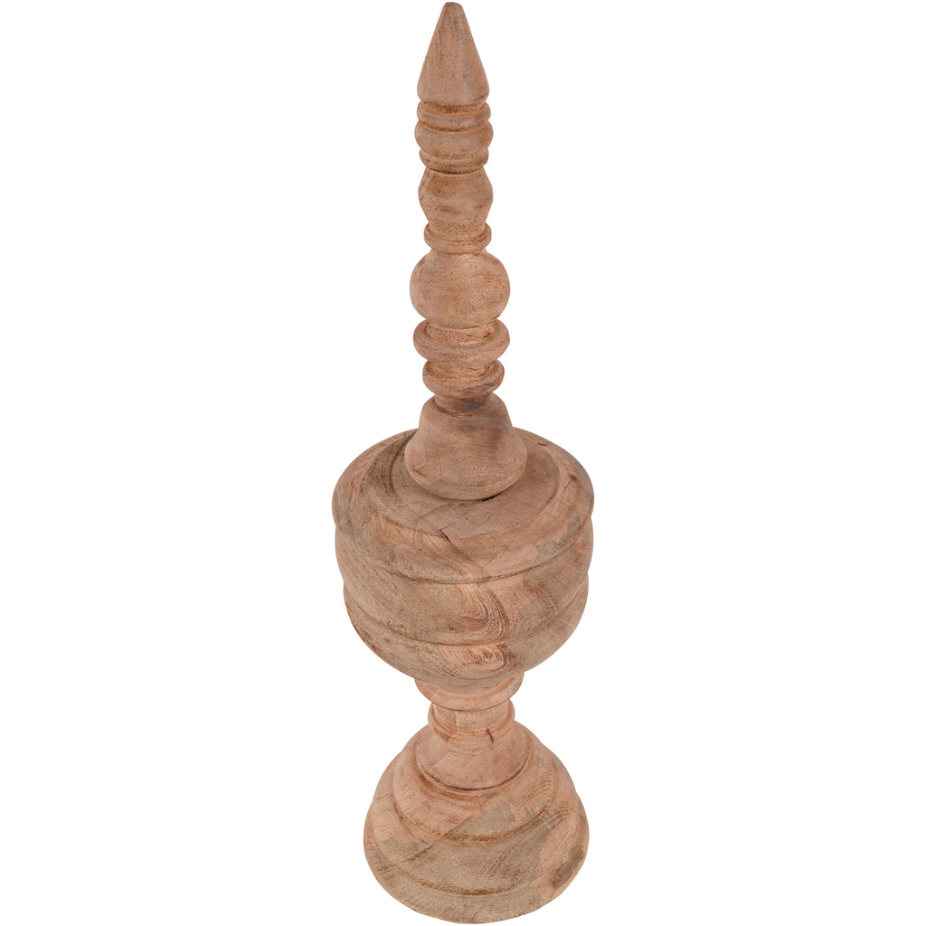 Angled view from above of the wooden finial sculpture, showing the broad central body and grain across its curved sections.