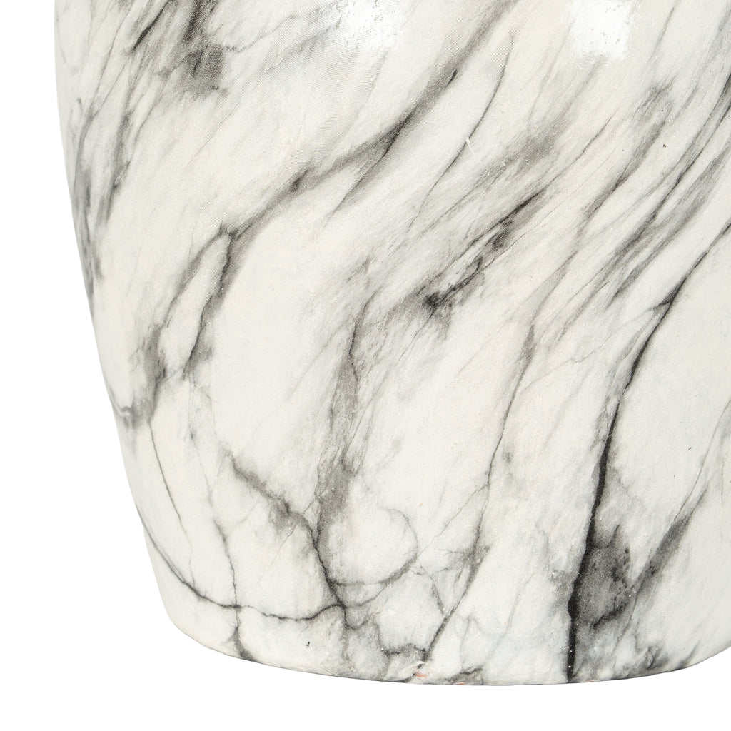 Detail of the vase's lower body, with branching charcoal lines and soft grey streaks across the glossy off-white surface.
