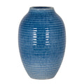 Blue oval vase with closely spaced horizontal ridges, pale flecks and a short open neck, shown against a white background.