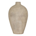 Full view of the cream Fleckmark Vase with broad rounded shoulders, a short neck and a tapered base against white.