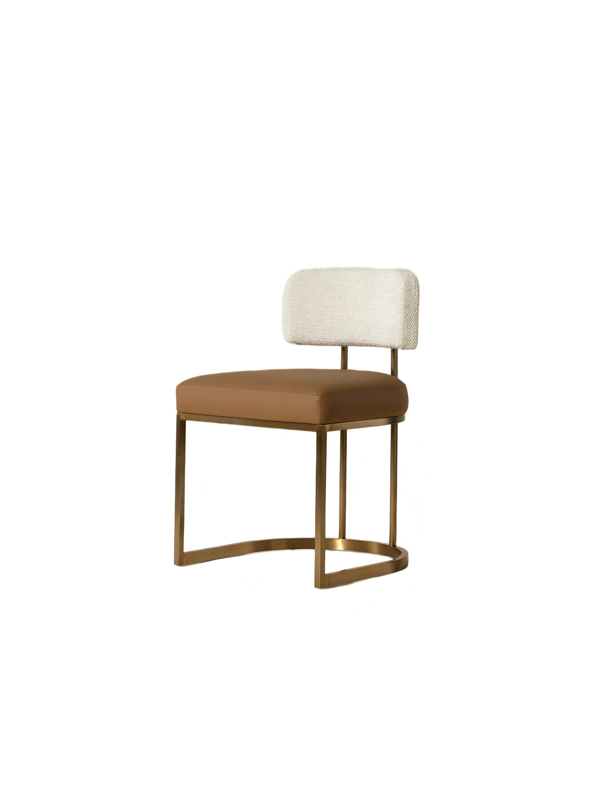 Three-quarter front view of an armless dining chair with a pale textured backrest, cognac seat and brass-toned open frame with a curved base, on white.