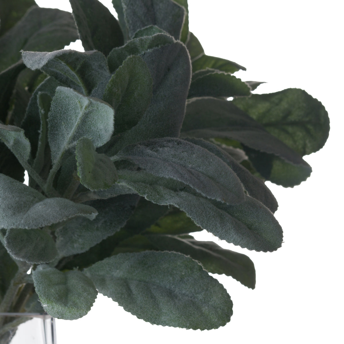 Close-up of overlapping sage-green artificial leaves showing their fuzzy flocked surfaces, leaf veins and gently scalloped edges.