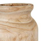 Close-up of the vase's thick rounded lip and curved neck, showing fine brown markings across the pale surface.
