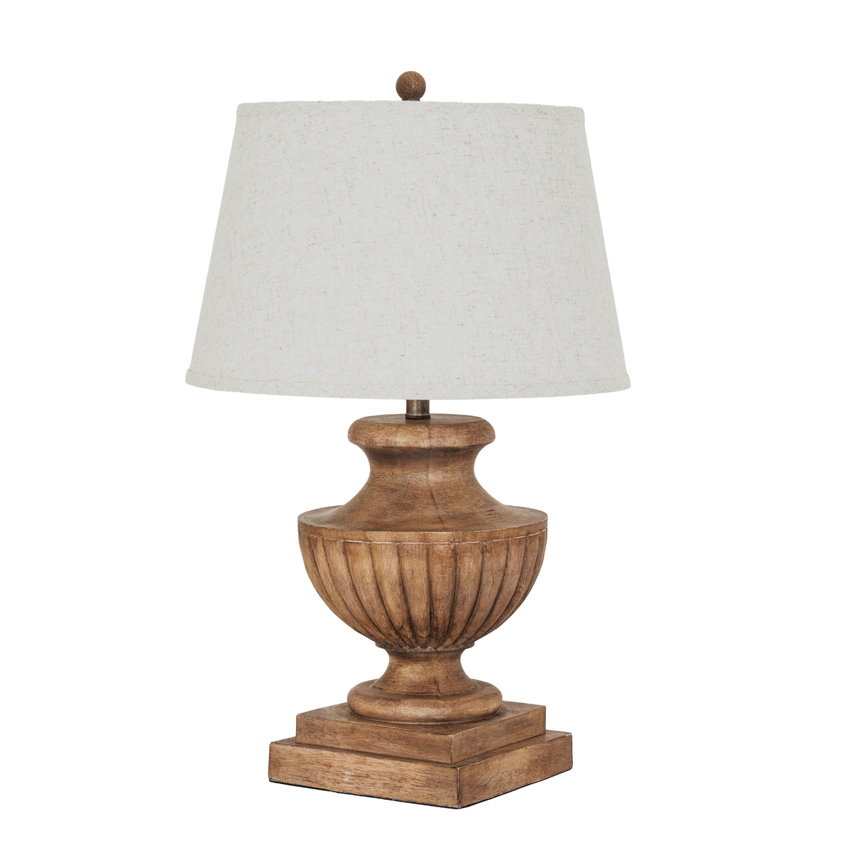 Fluted Bowlurn Table Lamp with a warm-brown urn base, stepped square plinth, pale tapered shade and ball finial against white.