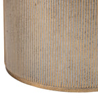 Close-up of vertical gold ridges and pale grey grooves around the drum pedestal, with a narrow gold rim at the base.