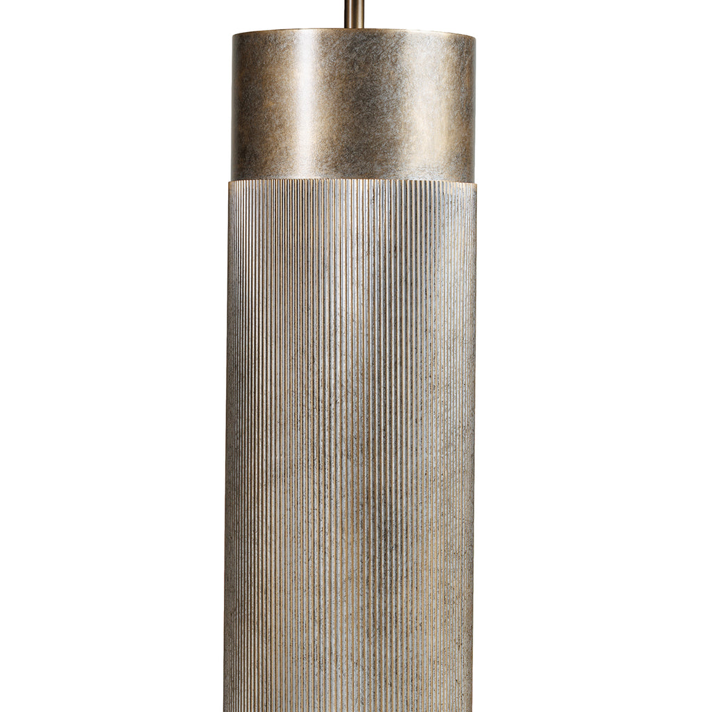 Close-up of the champagne-gold pedestal showing narrow vertical ridges beneath a smooth, mottled upper section.