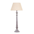Fluted Run Table Lamp with a pale tapered shade, long grey fluted stem and rounded details above a stepped circular foot.