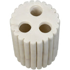 Elevated view of the fluted marble toothbrush holder showing its three separate slots and scalloped outer edge.