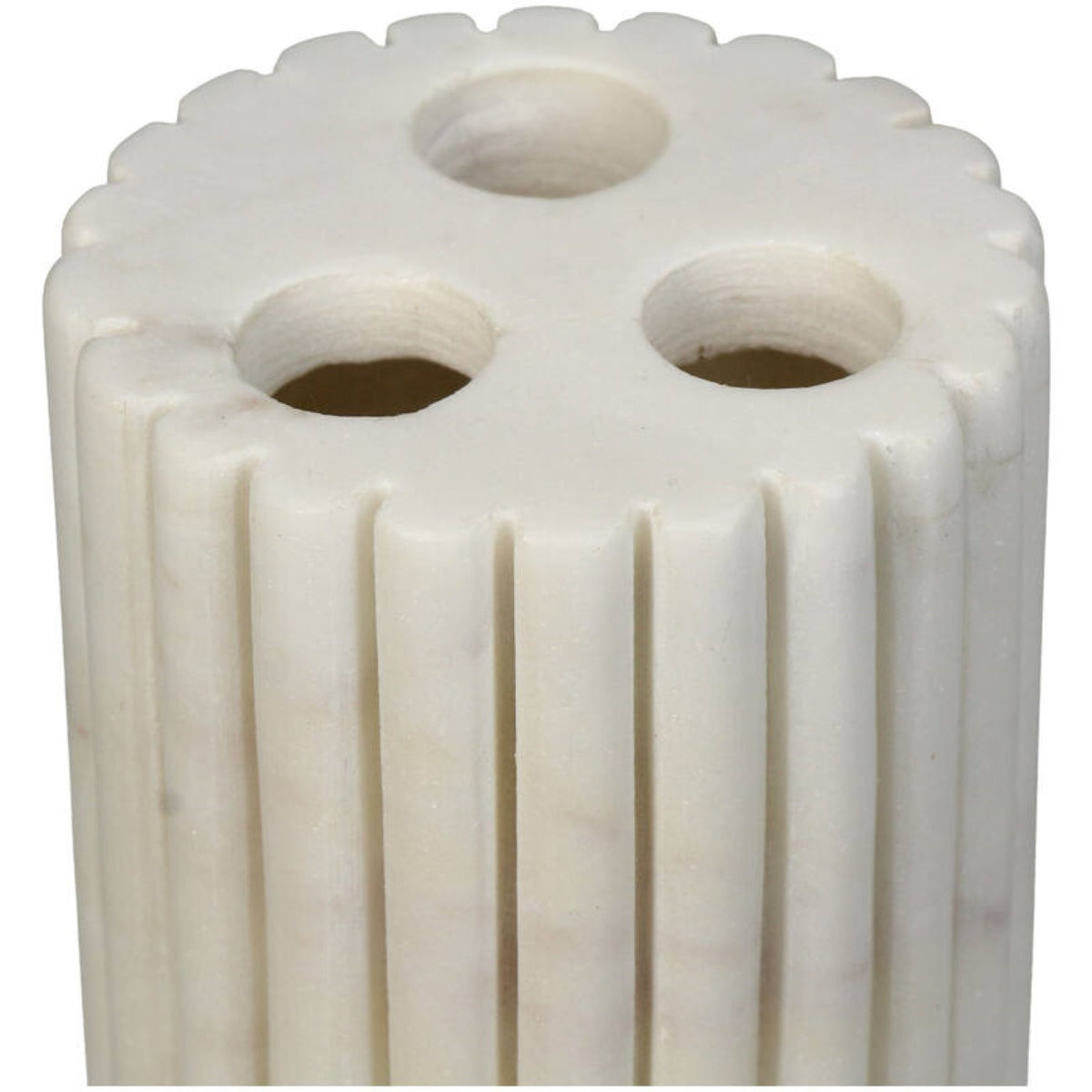 Close-up of the holder's white marble top, three circular slots and rounded vertical ribs.