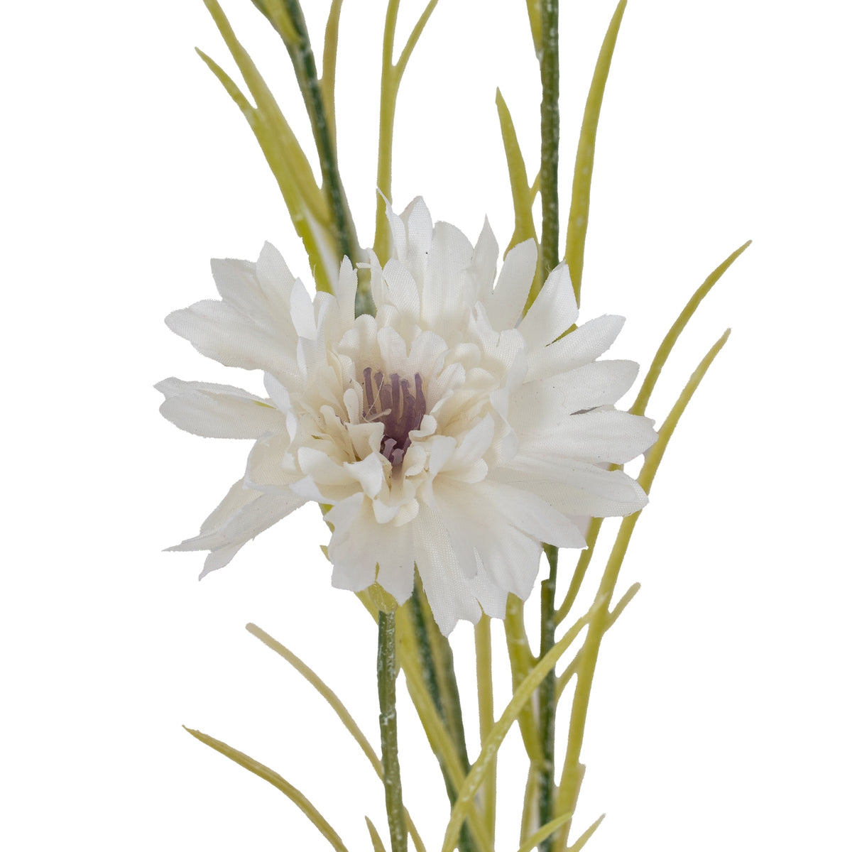 Close-up of a white artificial flowerhead showing overlapping textured petals and a muted purple centre, with green stems and slender leaves behind.
