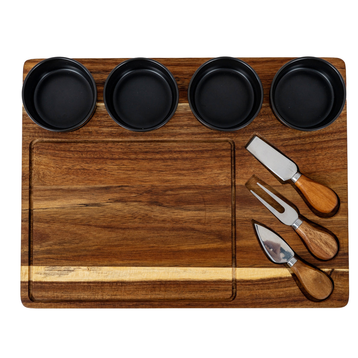 Overhead view of the cheese board showing four charcoal bowls across the top, a large outlined area on the left and three utensils on the right.