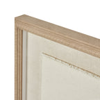 Angled detail of the upper frame corner, showing the tan beaded border and the frayed edge of the pale inner panel.