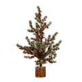 Full view of an artificial decorative tree with spreading green branches, red and black berries, white frosting and a cylindrical bark-like base.