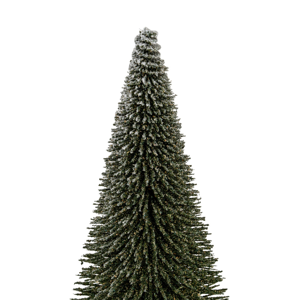 Close view of the decorative tree's irregular bristle tiers, showing white frosting concentrated around the narrow top and branch tips.