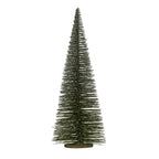Full view of a tall, tapered dark green brush tree with white frosted branches and a low round brown-green base.
