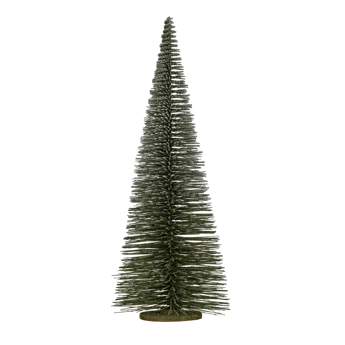 Full view of a tall, tapered dark green brush tree with white frosted branches and a low round brown-green base.