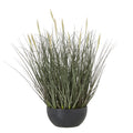 Artificial grass arrangement with spreading muted green blades and upright cream seed heads in a low black bowl-shaped pot.