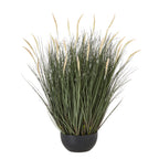 Full view of a dense artificial grass arrangement with spreading green blades and pale fuzzy seed heads in a low rounded black pot.