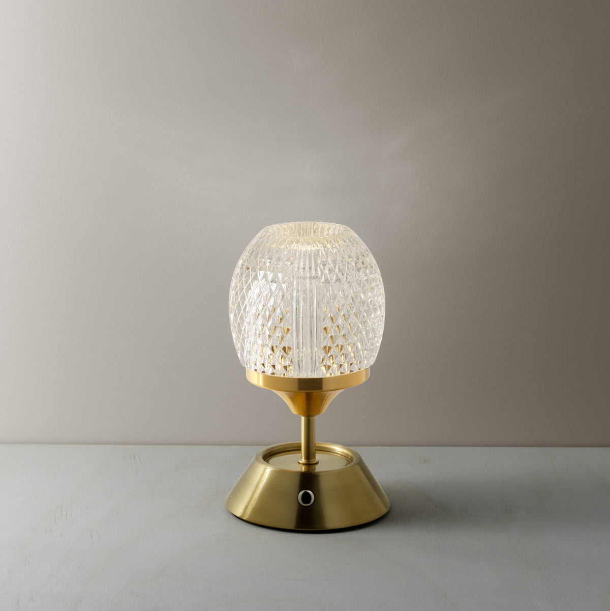 Glow Sinatra Rechargeable LED Table Lamp – Brass – illuminated with warm light